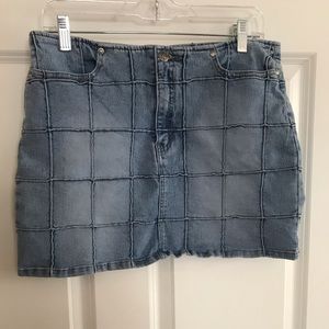 Unique light wash jean skirt stitched with squares